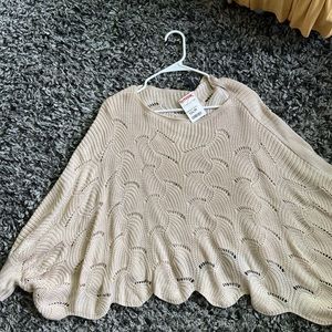 Never worn poncho/sweater